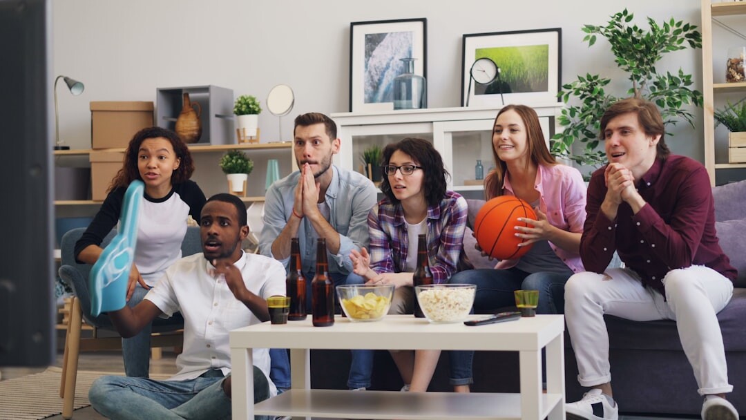 group watching tv