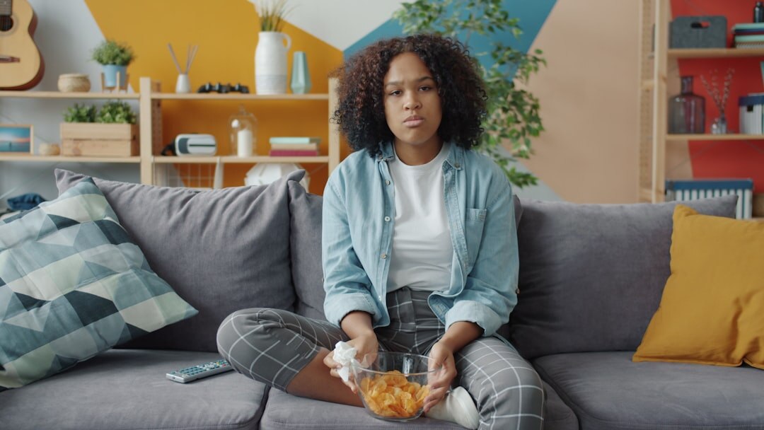 person watching tv at home