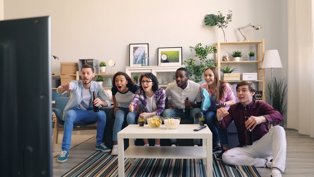people watching tv together