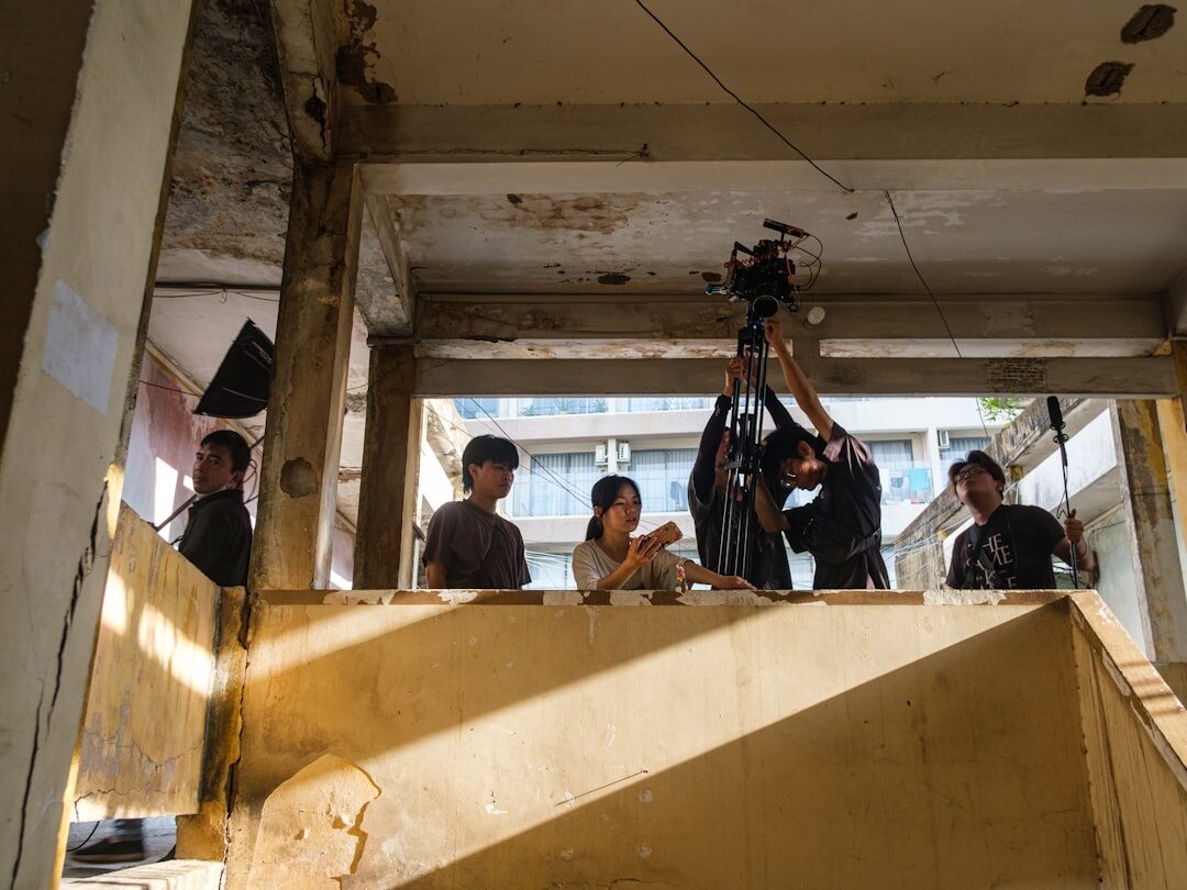 actors on set filming drama